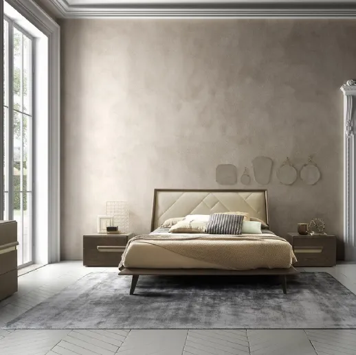 Letto in legno Cliff con testiera rivestita in pelle trapuntata di Mobilgam