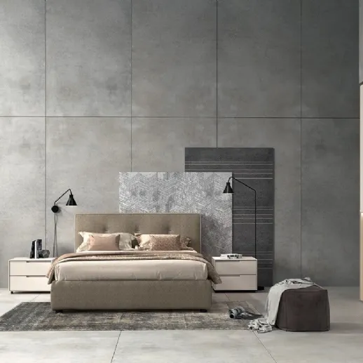 Letto in tessuto imbottito con testiera Vitalyty Float di Colombini Casa