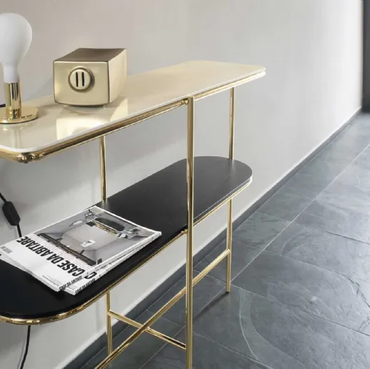 Mobile ingresso in ottone lucido con piano superiore in ceramica e piano inferiore in legno Puro Calligaris