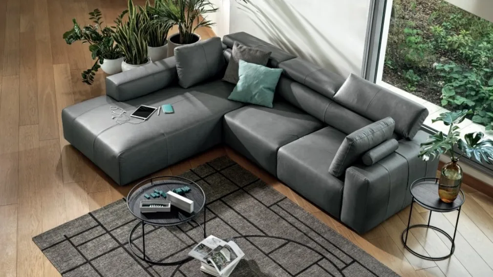 Divano relax in pelle con penisola Dado di Calligaris