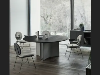 Tavolo rotondo Magnum con base in cemento e piano in legno impiallaciato di Bontempi