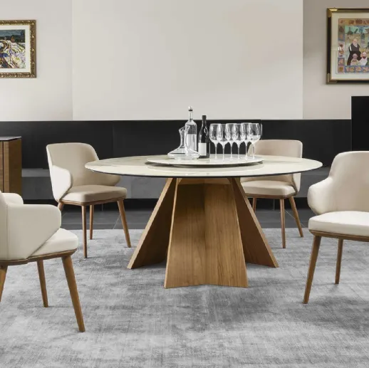 Tavolo rotondo con piano in ceramica e basamento in legno Icaro di Calligaris