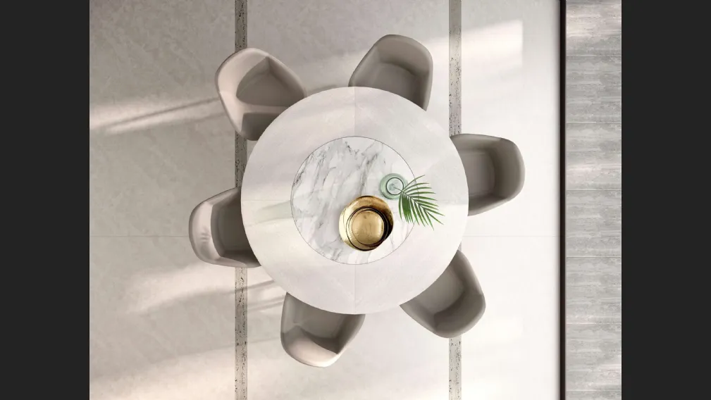 Tavolo rotondo allungabile in legno Veliero con vassoio girevole Lazy Susan in ceramica incassato nel piano di Ozzio